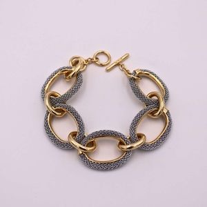 A&M Gold Metal and Silver Mesh Links Bracelet